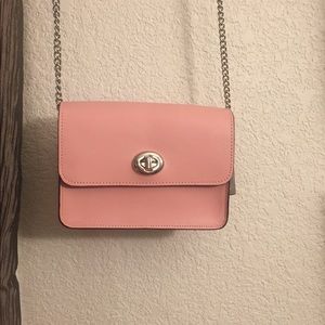 Coach mini handbag. Never used. New.